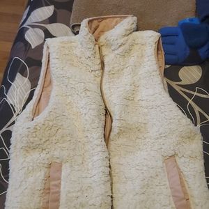 Womens reversible sherpa lined vest.